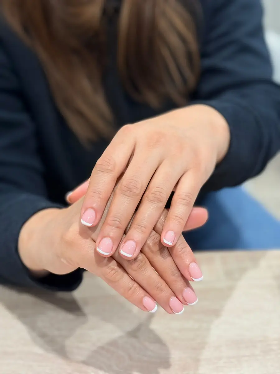 Soft pink French gel nails at Sahar Beauty Studio